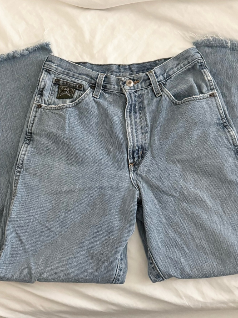 Straight leg mid rise blue jeans